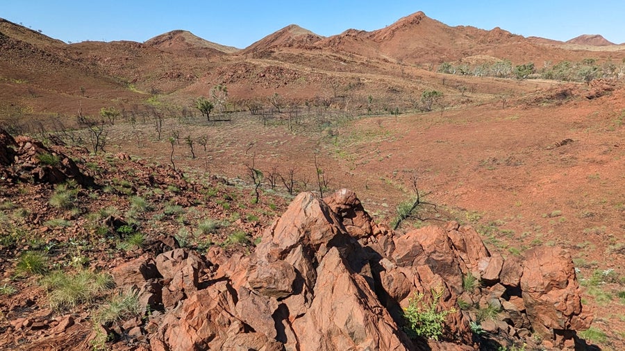 Large conical shatter cones within the Pilbara Craton landscape.