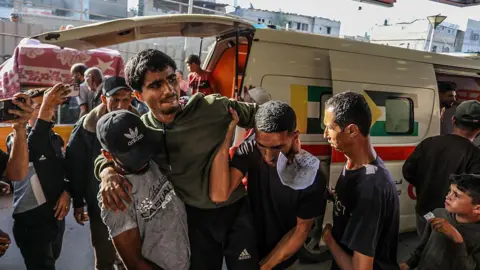 Getty Images Injured Palestinians are being brought to the Nasser Hospital for their treatment process after Israeli soldiers opened fire at Palestinians trying to reach the points where US aid is distributed west of Rafah city in the southern Gaza Strip, in Khan Yunis, Gaza on June 01, 2025. It was reported that 30 people were killed and 115 people were wounded as a result of the fire opened by Israeli soldiers.