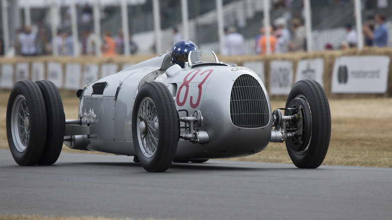 1936 Auto Union Type C entered by Audi Tradition and driven by Hans-Joachim Stuck at Goodwood on July 13th, 2018 in Chichester, England.