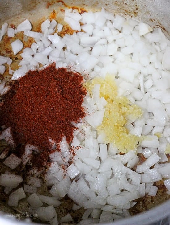 Onions with garlic and chili powder in Instant Pot.